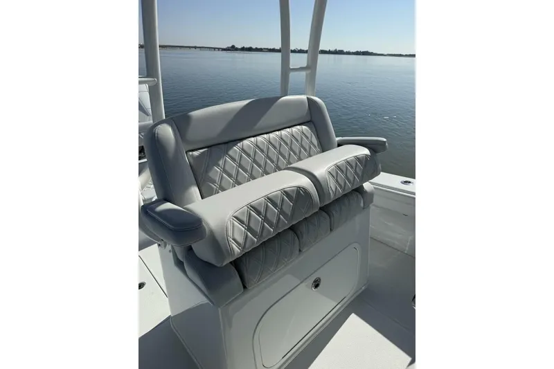 Slide: The Image of Luxurious seating on 2025 Yellowfin 26 Hybrid boat with quilted upholstery. - 17