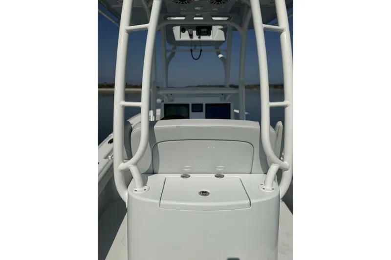 Slide: The Image of 2025 Yellowfin 26 Hybrid boat interior with sleek white design and modern console. - 21
