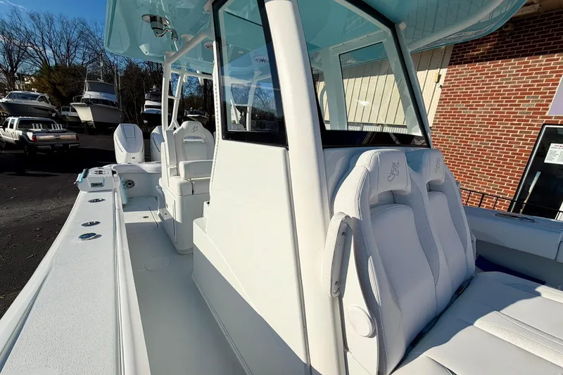 Slide: The Image of 2026 Yellowfin 36 Offshore boat with sleek white seating and modern design. - 10