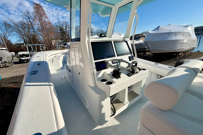 Slide: The Image of 2026 Yellowfin 36 Offshore boat with modern helm and navigation system. - 6