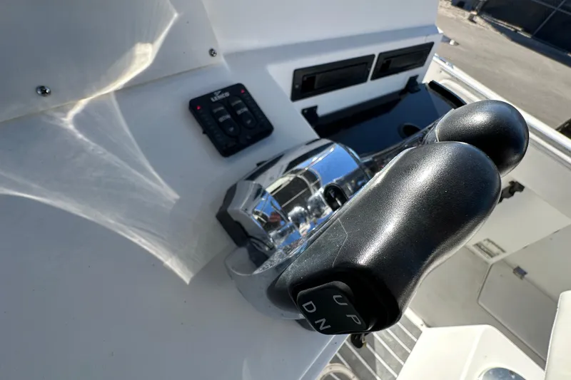 Slide: The Image of 1999 Robalo 2420 Center Console boat controls and dashboard close-up. - 25