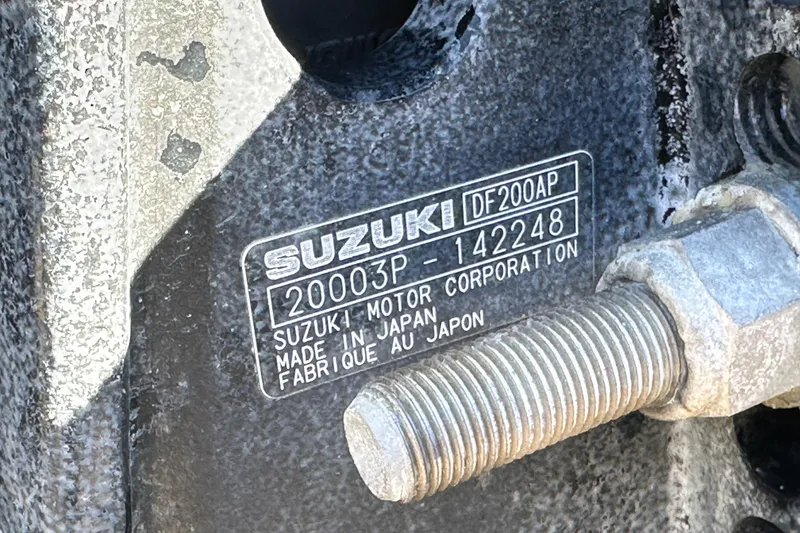 Slide: The Image of 1999 Robalo 2420 Center Console hull identification number on weathered surface. - 82