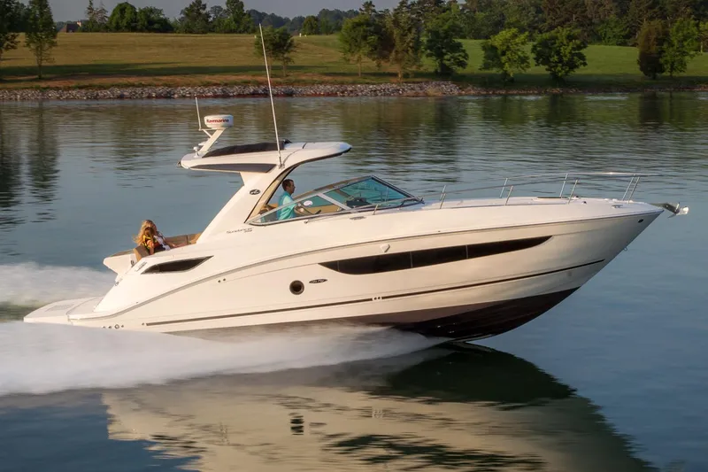 Slide: The Image of Manufacturer Provided Image: 2016 Sea Ray 350 Sundancer cruising on a calm lake. - 6