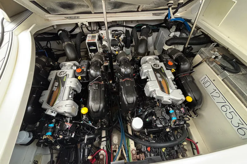 Slide: The Image of Engine compartment of a 2016 Sea Ray 350 Sundancer with twin engines visible. - 9