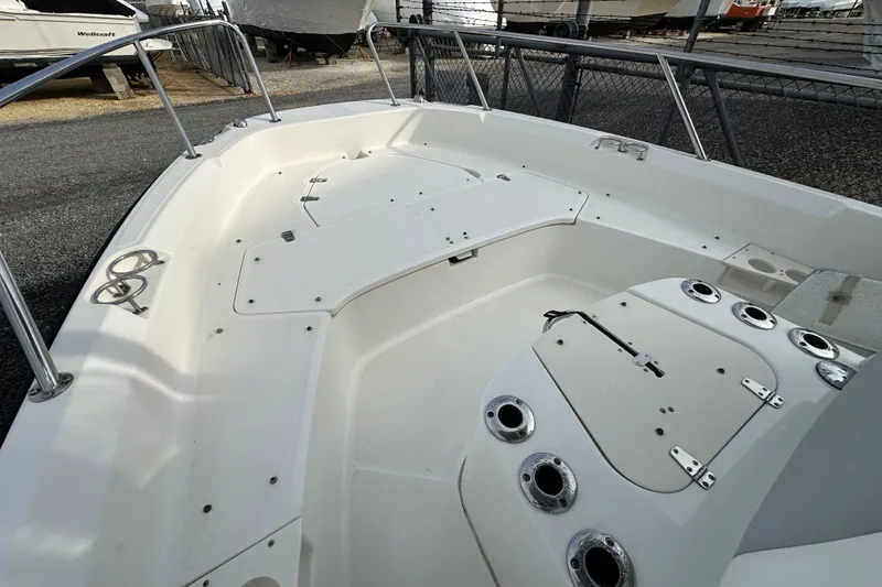 Slide: The Image of Interior of a 2016 Boston Whaler 210 Dauntless boat with storage and supplies. - 13