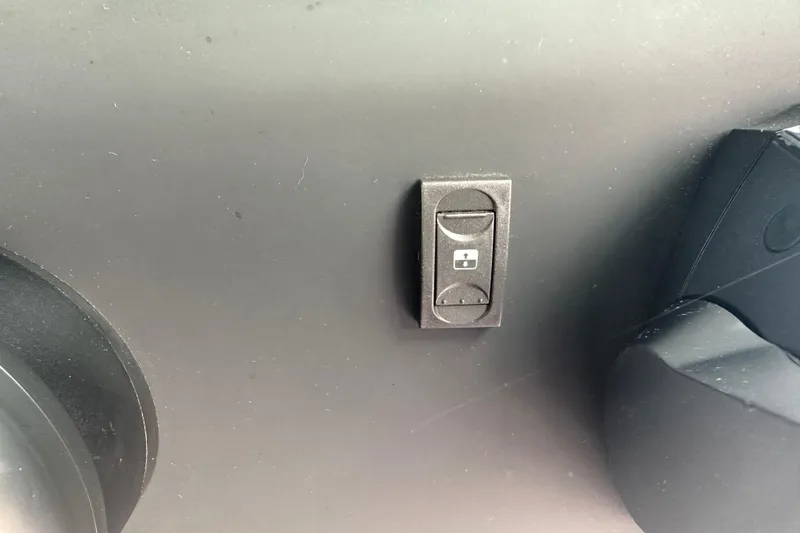 Slide: The Image of Switch panel on 2022 Axopar 37 XC Cross Cabin dashboard. - 5