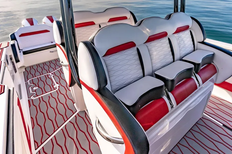 Slide: The Image of Manufacturer Provided Image: Luxurious seating on 2026 Sunsation 40 CCX boat with red and white upholstery. - 11