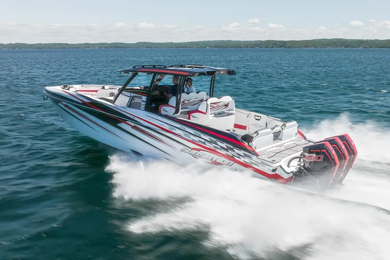 Slide: The Image of Manufacturer Provided Image: 2026 Sunsation 40 CCX speedboat cruising on open water, showcasing sleek design and powerful engines. - 7