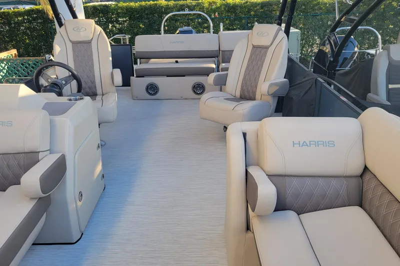 Slide: The Image of 2023 Harris Sunliner 250 Sport interior with luxurious seating and modern design. - 18
