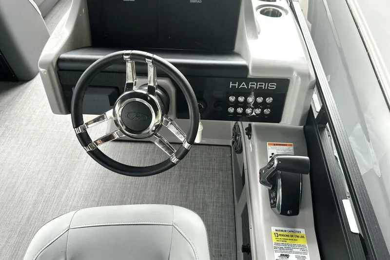 Slide: The Image of 2023 Harris Sunliner 250 Sport interior with luxurious seating and modern design. - 8