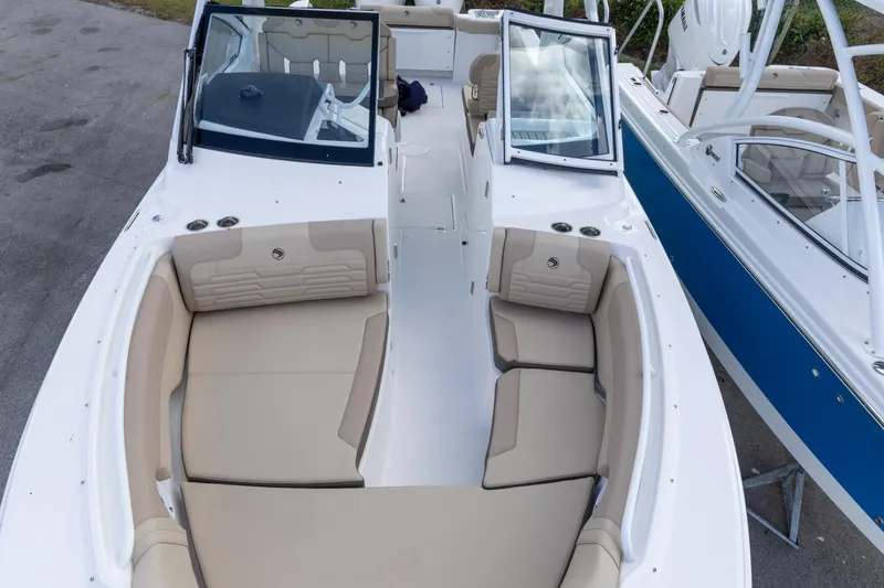 Slide: The Image of 2026 Edgewater 262CX Crossover boat with spacious seating and modern design. - 13