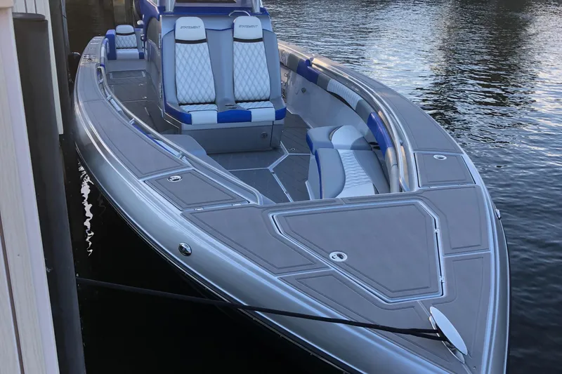 Slide: The Image of 2019 Statement Center Console boat docked at marina. - 1