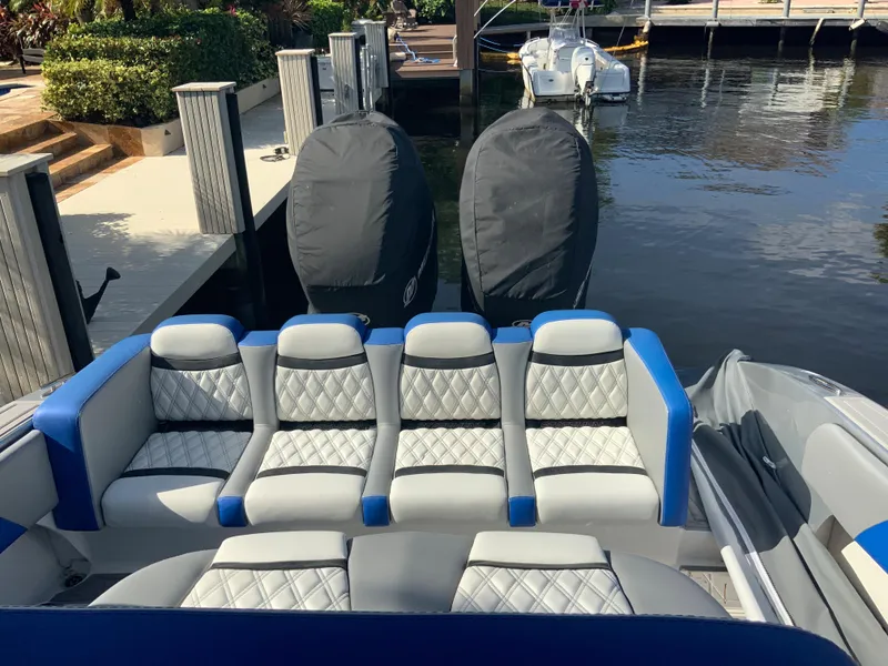 Slide: The Image of Luxurious 2019 Statement Center Console boat at dock. - 3