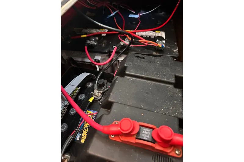 Slide: The Image of Electrical wiring and battery setup in a 2006 Duffy Cat 16 boat. - 5