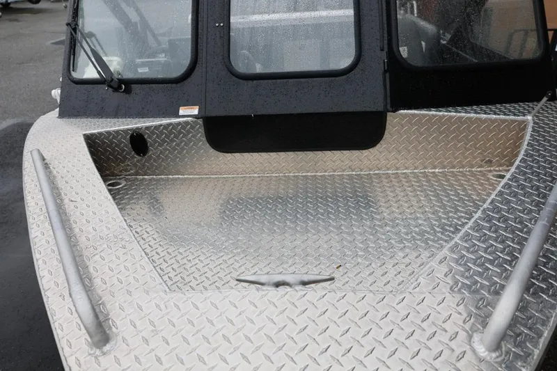 Slide: The Image of 2022 Thunder Jet 185 Luxor boat with a sleek aluminum hull and covered cabin. - 10