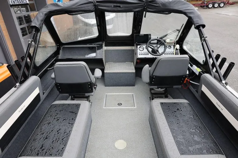 Slide: The Image of 2022 Thunder Jet 185 Luxor boat with windshield and diamond plate deck. - 13