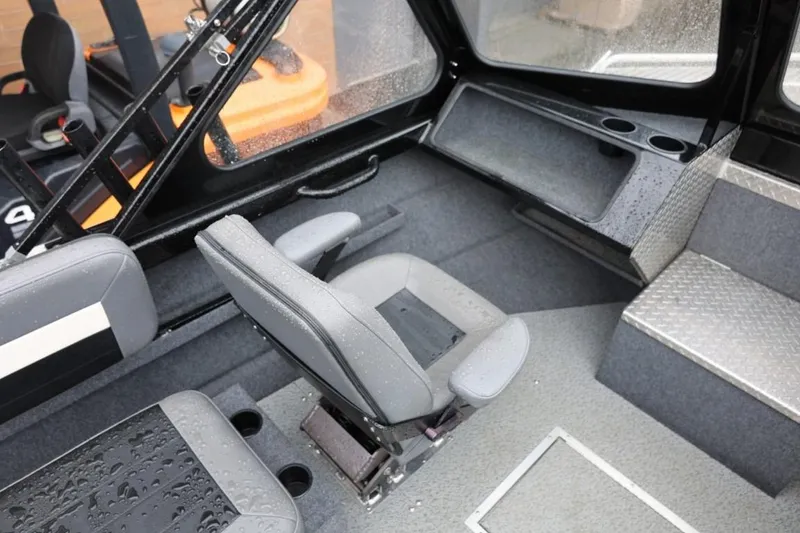 Slide: The Image of 2022 Thunder Jet 185 Luxor boat interior with steering wheel and control panel. - 18