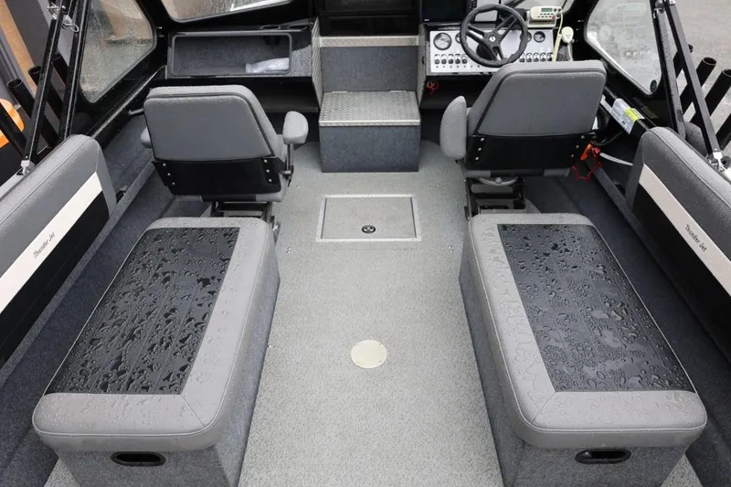 Slide: The Image of Interior of 2022 Thunder Jet 185 Luxor boat with seating and control panel. - 19