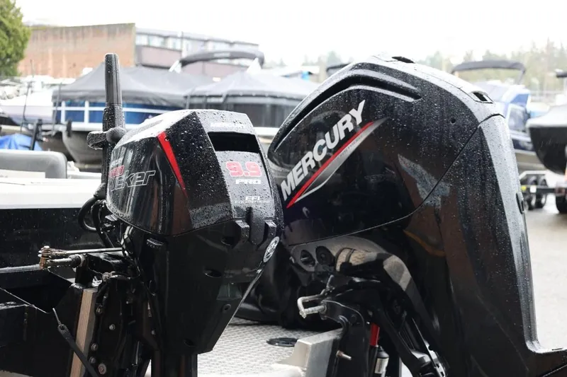 Slide: The Image of Interior of 2022 Thunder Jet 185 Luxor boat with seating and control panel. - 2