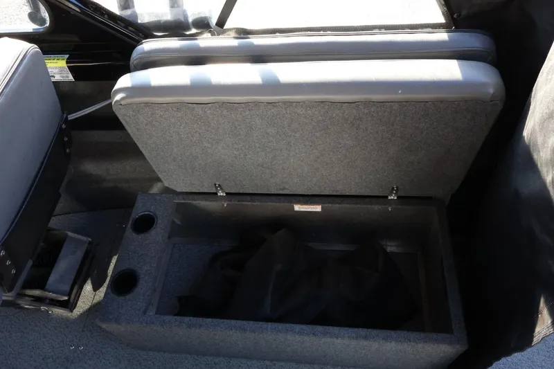 Slide: The Image of 2022 Thunder Jet 185 Luxor boat interior storage compartment with cup holders. - 37