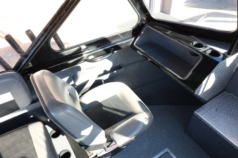 Slide: The Image of Interior of 2022 Thunder Jet 185 Luxor boat with seating and storage compartments. - 39