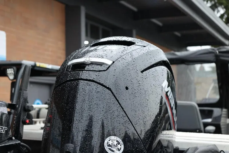 Slide: The Image of Mercury and Tohatsu outboard motors on a 2022 Thunder Jet 185 Luxor boat. - 4