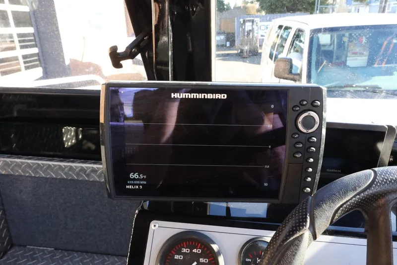 Slide: The Image of Humminbird Helix 9 fish finder on 2022 Thunder Jet 185 Luxor dashboard. - 45