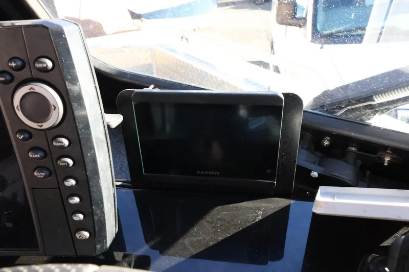 Slide: The Image of Dashboard of 2022 Thunder Jet 185 Luxor with Garmin navigation system. - 46