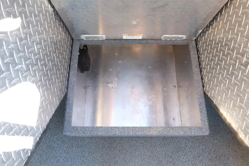 Slide: The Image of Interior view of 2022 Thunder Jet 185 Luxor boat, featuring metal flooring and textured surfaces. - 47
