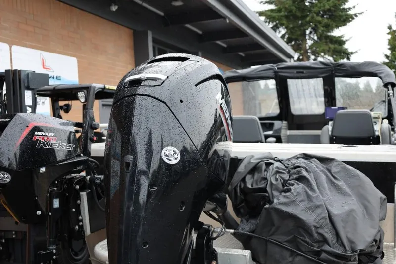 Slide: The Image of Close-up of a 2022 Thunder Jet 185 Luxor boat propeller on wet pavement. - 5