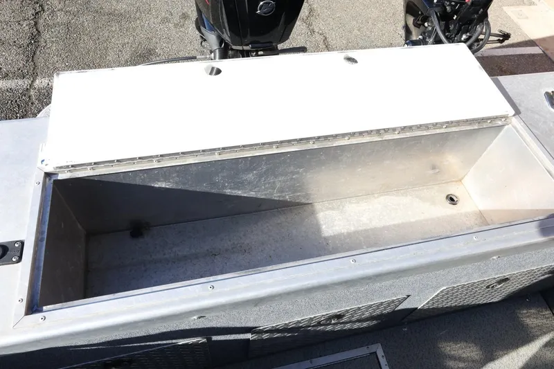 Slide: The Image of Open storage compartment on a 2022 Thunder Jet 185 Luxor boat. - 54