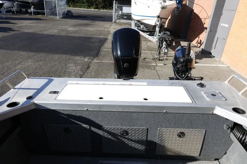 Slide: The Image of 2022 Thunder Jet 185 Luxor boat interior with motor and storage compartments. - 55