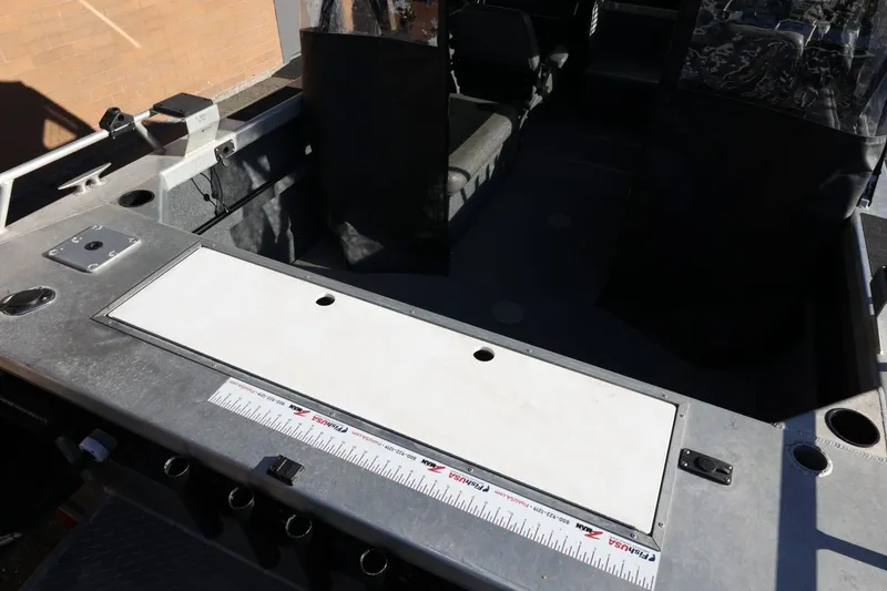 Slide: The Image of 2022 Thunder Jet 185 Luxor boat interior with seating and measurement ruler. - 56