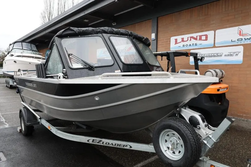 Slide: The Image of 2022 Thunder Jet 185 Luxor boat with Mercury Pro Kicker engine in a showroom. - 7