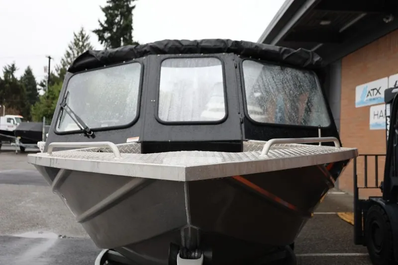 Slide: The Image of 2022 Thunder Jet 185 Luxor boat on trailer, parked outdoors. - 8