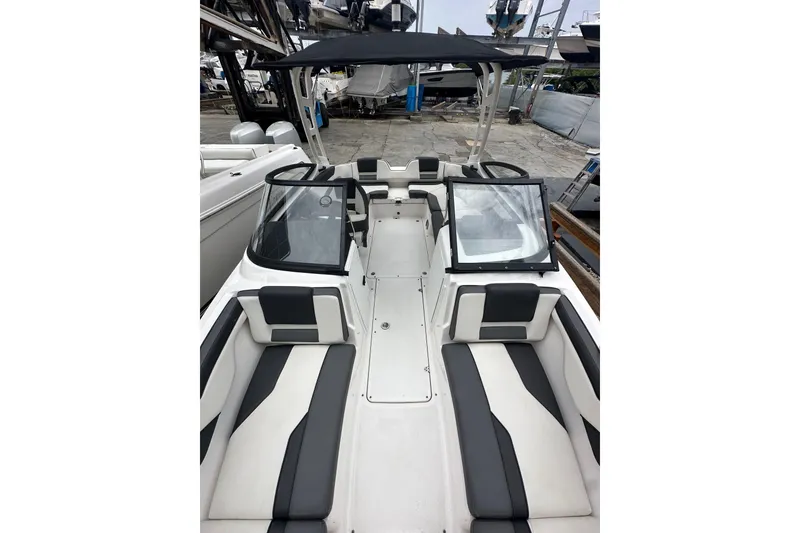 Slide: The Image of 2021 Yamaha Boats AR210 interior with sleek seating and modern design. - 6