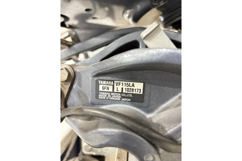 Slide: The Image of Close-up of Yamaha VF115LA engine label on 2022 Express H20 Bay boat. - 25