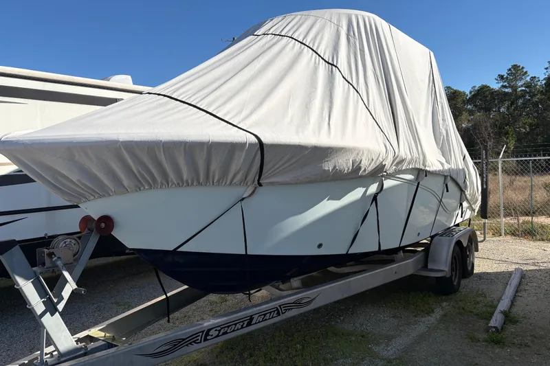 Slide: The Image of Covered 2016 Sea Fox 249 Avenger boat on trailer, parked outdoors. - 13