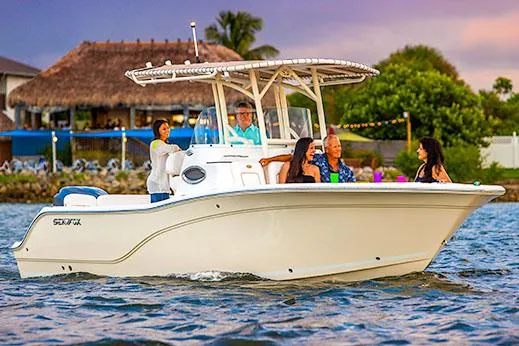Slide: The Image of Manufacturer Provided Image: 2016 Sea Fox 249 Avenger boat cruising with passengers on a scenic waterway. - 26