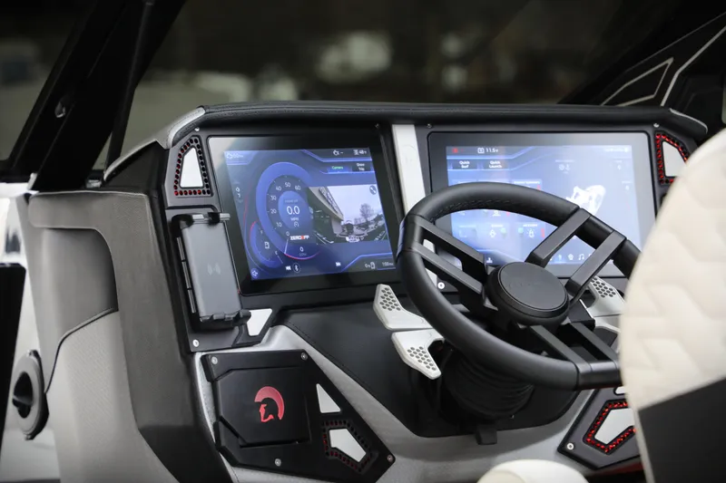Slide: The Image of 2026 Centurion Ri245 dashboard with dual touchscreens and modern steering wheel. - 14