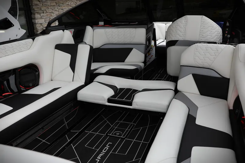 Slide: The Image of Luxurious interior of 2026 Centurion Ri245 boat with modern black and white seating. - 20
