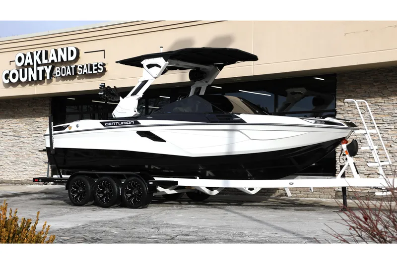 Slide: The Image of 2026 Centurion Ri245 boat displayed at Oakland County Boat Sales. - 3