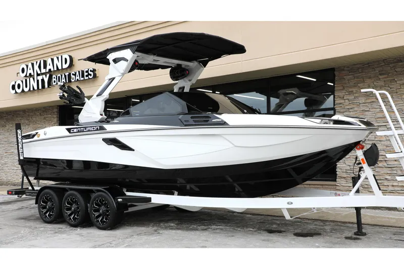 Slide: The Image of 2026 Centurion Ri245 boat on trailer at Oakland County Boat Sales. - 8