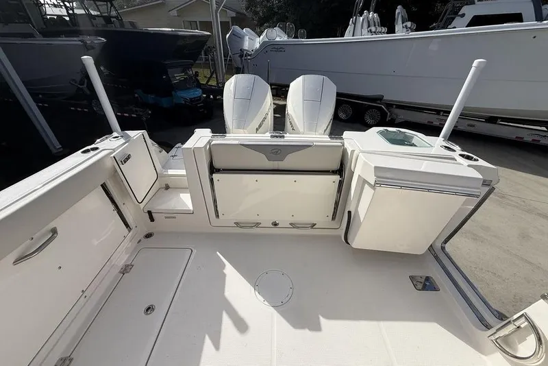 Slide: The Image of 2026 Sailfish 276 DC boat interior with seating and storage compartments. - 17