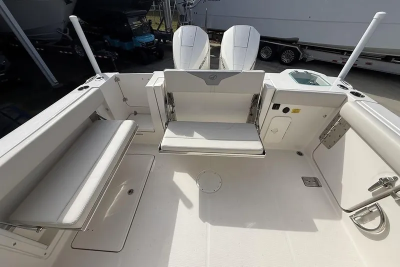 Slide: The Image of 2026 Sailfish 276 DC boat interior with seating and storage compartments. - 21