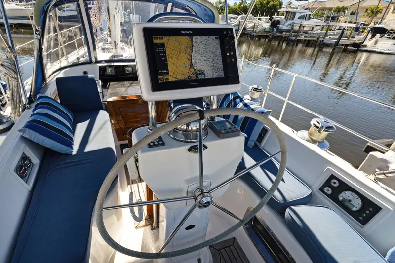 Slide: The Image of Cockpit of 2009 Hylas 46 yacht with navigation system and seating. - 14
