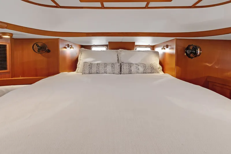 Slide: The Image of Luxurious cabin interior of 2009 Hylas 46 yacht with cozy bedding. - 42