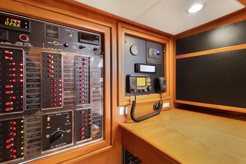 Slide: The Image of Control panel of a 2009 Hylas 46 yacht with navigation and communication equipment. - 57