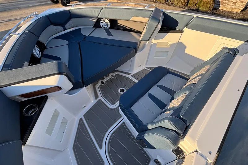 Slide: The Image of 2026 Monterey Elite 30 OB boat interior with luxurious seating and modern design. - 30