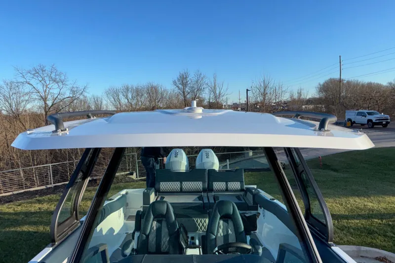 Slide: The Image of 2026 Monterey Elite 30 OB boat with sleek design and modern features. - 41